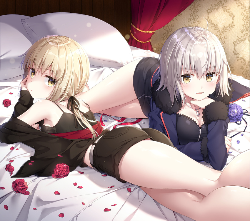 artoria_pendragon_(all) ass bed bed_sheet black_jacket black_shirt black_shorts blonde_hair blue_jacket breasts camisole canopy_bed cleavage cushion elbow_rest fate/grand_order fate_(series) from_behind hair_between_eyes indoors jacket jeanne_d'arc_(alter)_(fate) jeanne_d'arc_(fate)_(all) kneepits large_breasts looking_at_viewer lying masuishi_kinoto multiple_girls on_stomach parted_lips petals saber_alter shirt shorts silver_hair sleeveless sleeveless_shirt smile thighs wicked_dragon_witch_ver._shinjuku_1999 yellow_eyes