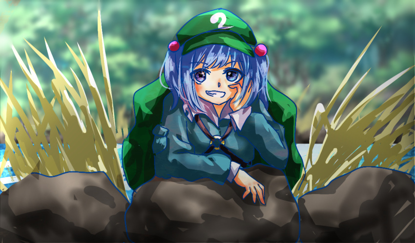 1girl backpack bag blue_eyes blue_hair blurry blurry_background green_bag green_headwear hand_on_own_face kawashiro_nitori plant rock shee_take smile solo stalk touhou