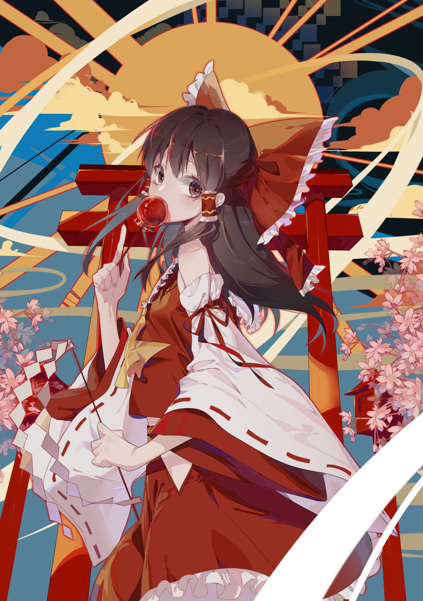 bow brown_eyes brown_hair candy_apple cloud covering_mouth detached_sleeves eating flower food gohei hair_bow hair_tubes hakurei_reimu highres index_finger_raised long_hair looking_at_viewer red_bow red_ribbon red_skirt ribbon ribbon-trimmed_sleeves ribbon_trim shide skirt skirt_set solo sun torii touhou vest zhibuji_loom