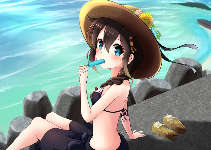 adapted_costume amagami_(makise_tsubaki) bikini black_bikini black_skirt blue_eyes blue_flower blush braid brown_hair eating flower food hair_between_eyes hair_flaps hat holding kantai_collection long_hair md5_mismatch ocean pink_flower popsicle remodel_(kantai_collection) shigure_(kantai_collection) single_braid sitting skirt solo swimsuit yellow_flower