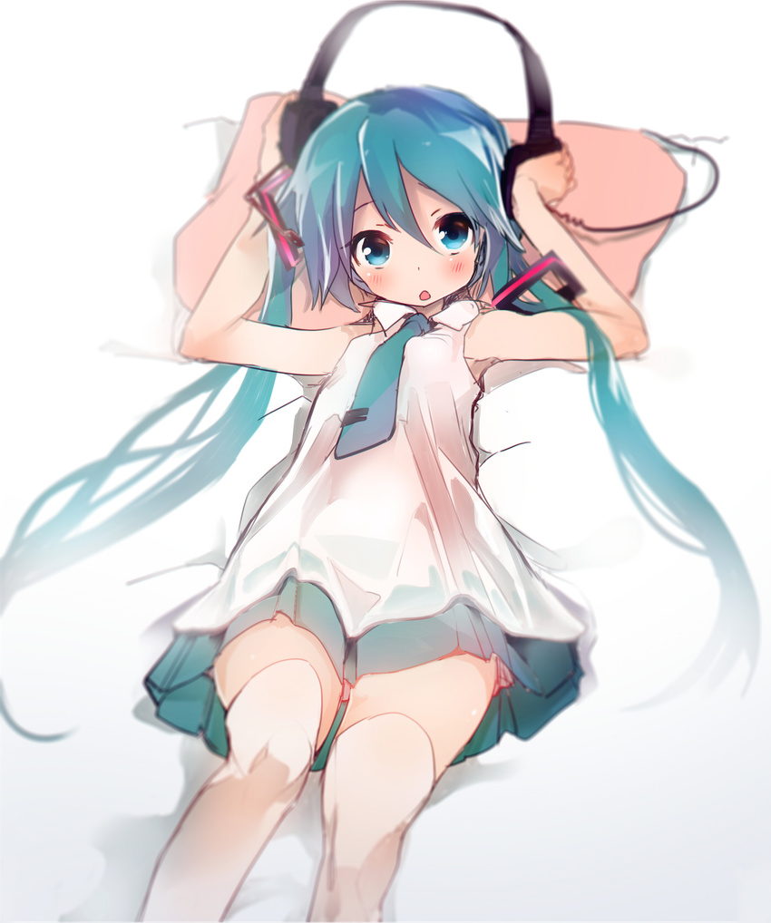 aqua_eyes aqua_hair blush hands_on_headphones hatsune_miku headphones headphones_removed highres hiyo_kotori long_hair looking_at_viewer lying necktie on_back open_mouth pillow skirt solo thighhighs twintails very_long_hair vocaloid white_legwear