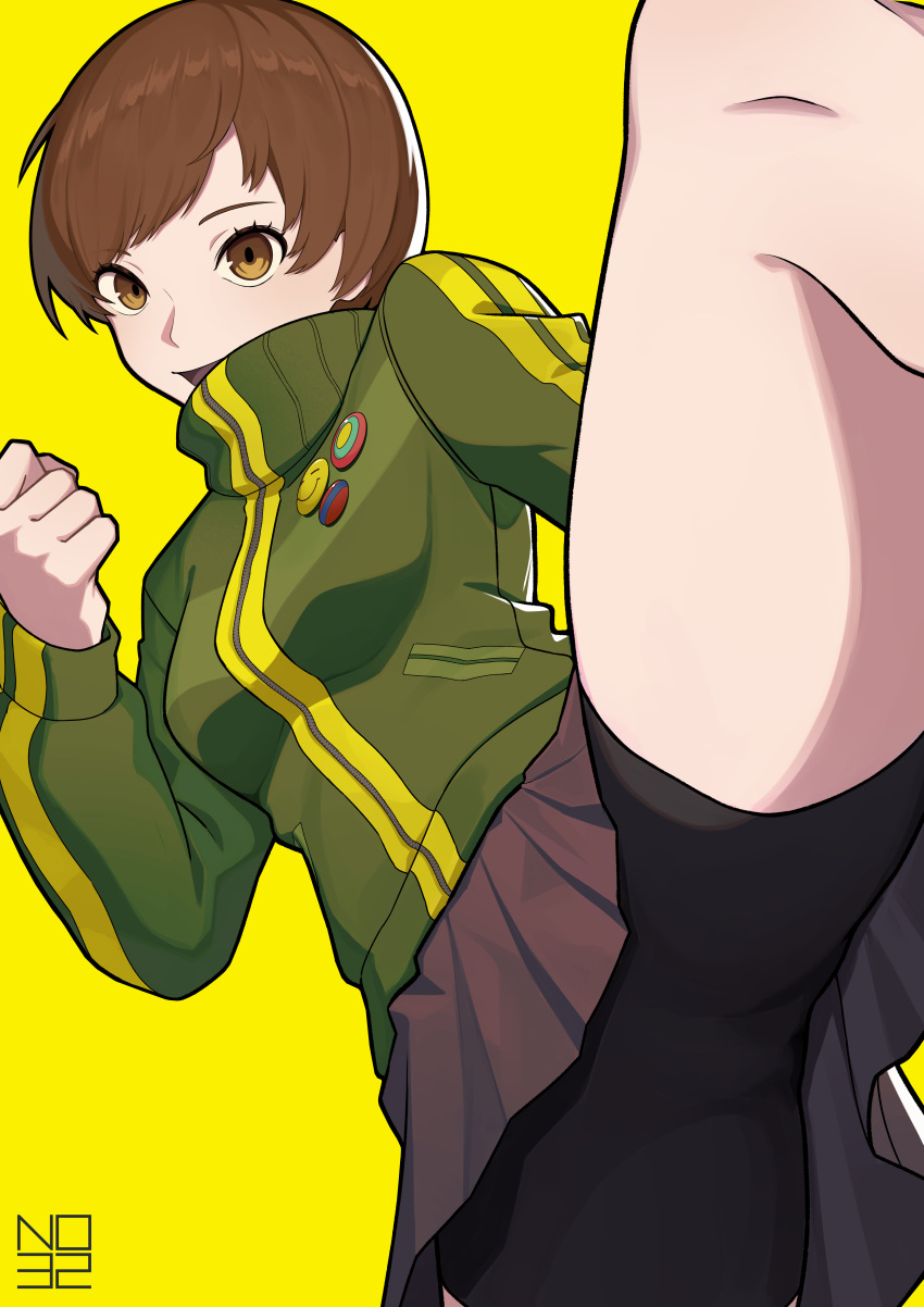 1girl absurdres badge bike_shorts black_skirt brown_eyes brown_hair clenched_hand highres leg_up light_brown_hair no32_mini persona persona_4 persona_4_the_golden pixiv_username satonaka_chie short_hair simple_background skirt solo tomboy yellow_background