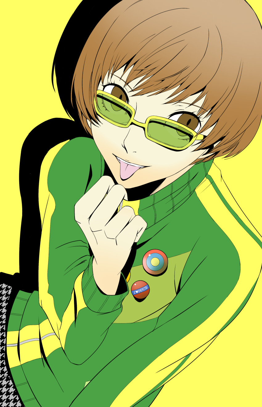 1girl absurdres badge brown_eyes brown_hair button_badge green_jacket hareruya_(smomo2227) highres houndstooth jacket light_brown_hair persona persona_4 reverse_trap satonaka_chie short_hair simple_background solo tomboy tongue tongue_out track_jacket yellow-framed_eyewear yellow_background