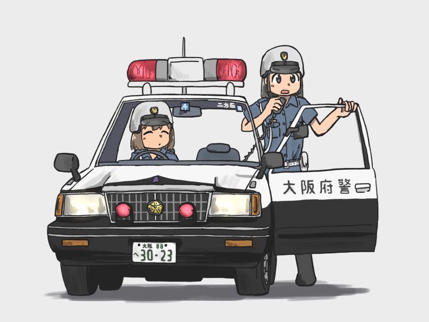 2girls blue_shirt car grey_background grey_hair helmet highres holding holding_microphone looking_to_the_side medium_hair microphone motor_vehicle multiple_girls ni_tsuma nissan nissan_cedric open_door open_mouth original police police_car shirt simple_background standing wire