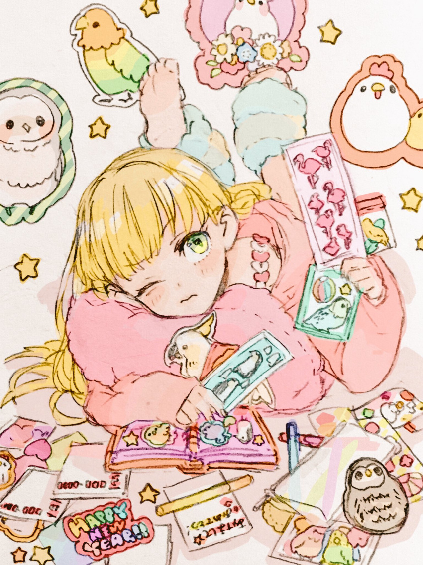 1girl barefoot bird blonde_hair chick chicken gacho_p green_eyes hair_down happy_new_year highres idolmaster idolmaster_cinderella_girls jougasaki_rika leg_warmers long_hair lying notebook on_stomach one_eye_closed owl pajamas parrot pillow soles solo sticker