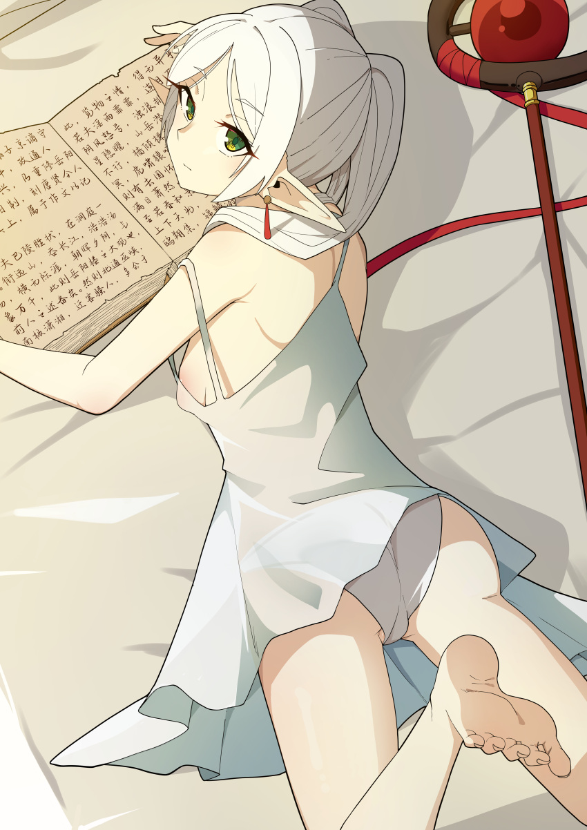 1girl absurdres ass bare_shoulders barefoot bed_sheet book breasts dress earrings expressionless frieren from_above green_eyes grey_dress grey_hair grey_panties highres jewelry lingnerpoi looking_at_viewer looking_back open_book panties small_breasts smile solo sousou_no_frieren staff twintails underwear