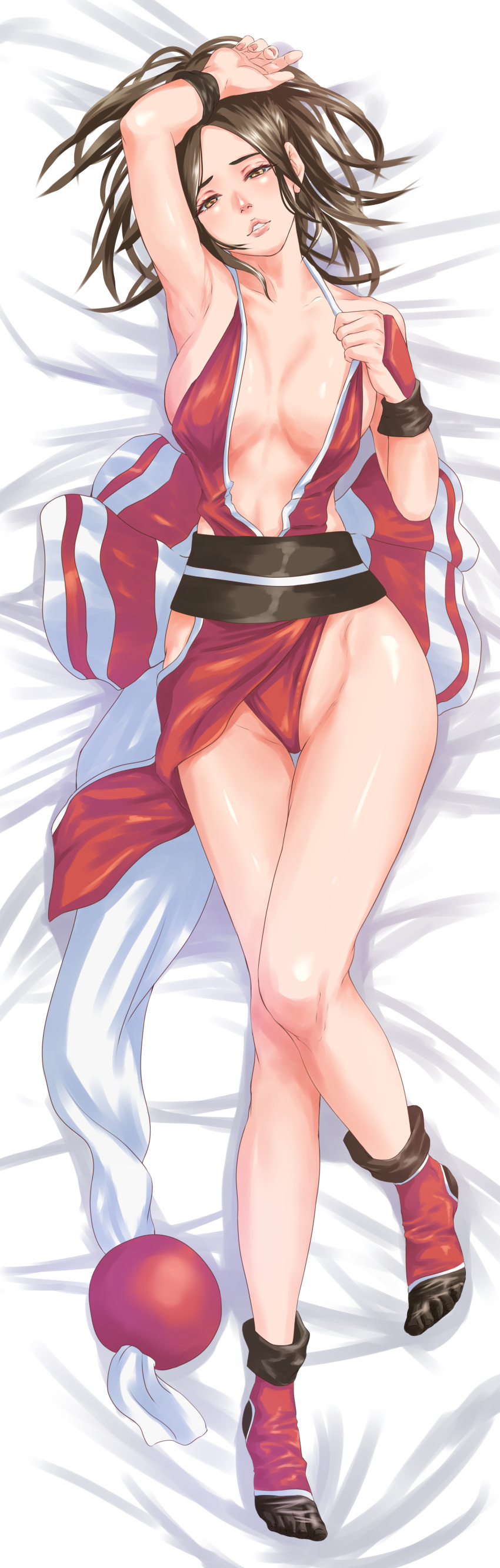 1girl absurdres arm_up bed_sheet breasts brown_eyes brown_hair commentary_request dakimakura_(medium) fatal_fury from_above full_body high_ponytail highres japanese_clothes knees_together_feet_apart large_breasts legs long_hair looking_at_viewer lying ninja omaehasaigoni on_back pelvic_curtain ponytail revealing_clothes shiny_skin shiranui_mai smile solo tabi the_king_of_fighters thighs