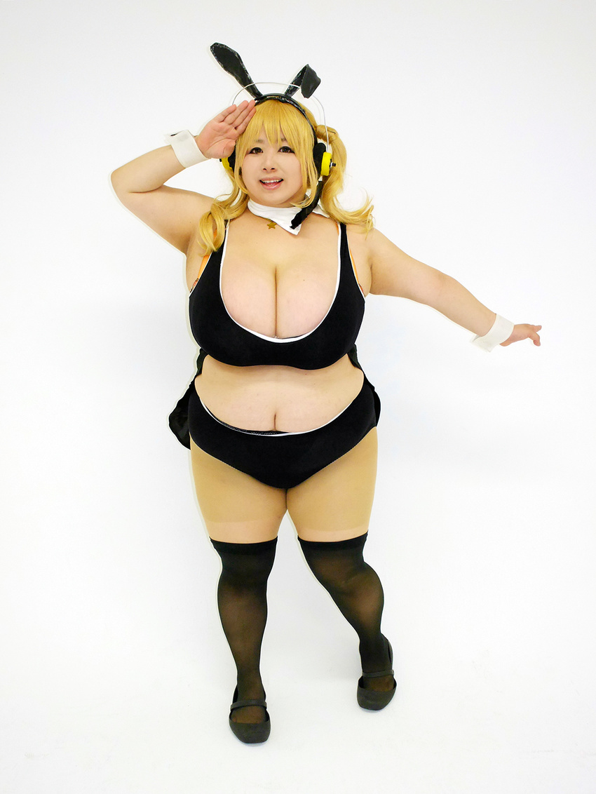 1girl asian blonde_hair breasts brown_eyes cleavage cosplay fat headphones hoshima_mika huge_breasts jewelry necklace nitroplus photo solo star super_pochaco super_pochaco_(cosplay) twintails