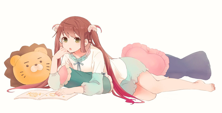 1girl :o asagumo_(kantai_collection) bangs bare_legs barefoot book brown_hair cushion green_eyes hair_ornament hand_on_own_chin highres kantai_collection lion long_hair long_sleeves lying open_mouth pajamas pillow ribbon shakemi_(sake_mgmgmg) shorts simple_background solo twintails white_background