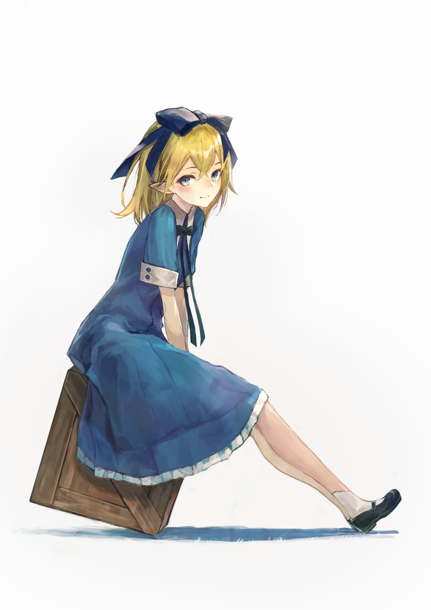 bangs between_legs black_neckwear blonde_hair blue_bow blue_eyes blush bow bowtie box closed_mouth dress frilled_dress frills full_body hair_bow hand_between_legs highres kobuta leaning_forward long_hair looking_at_viewer looking_to_the_side on_box original pointy_ears shoes short_sleeves simple_background sitting sitting_on_box smile solo white_background white_legwear wooden_box