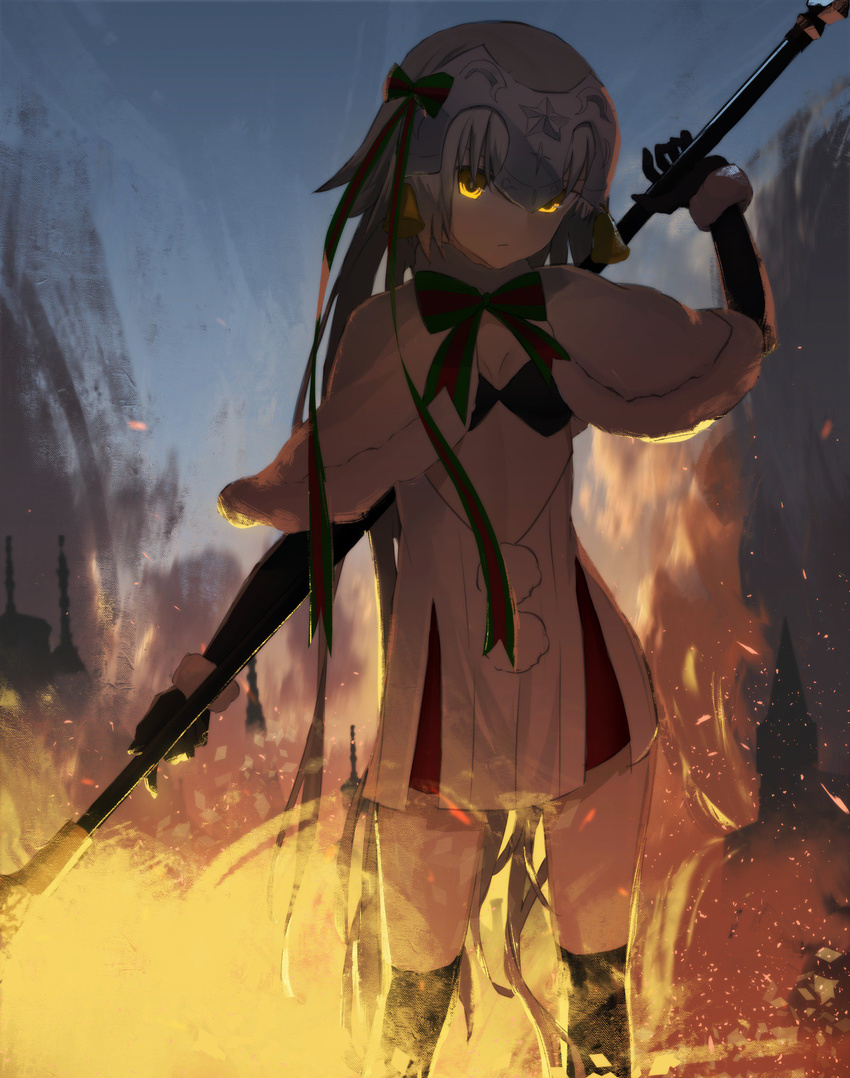 absurdres asuteroid bangs bell black_gloves black_legwear bow capelet closed_mouth commentary cowboy_shot fate/grand_order fate_(series) fire fur_trim gloves green_ribbon hair_ribbon headpiece highres holding holding_spear holding_weapon jeanne_d'arc_(fate)_(all) jeanne_d'arc_alter_santa_lily long_hair looking_at_viewer polearm ribbon shadowed solo spear standing striped striped_bow striped_ribbon weapon yellow_eyes