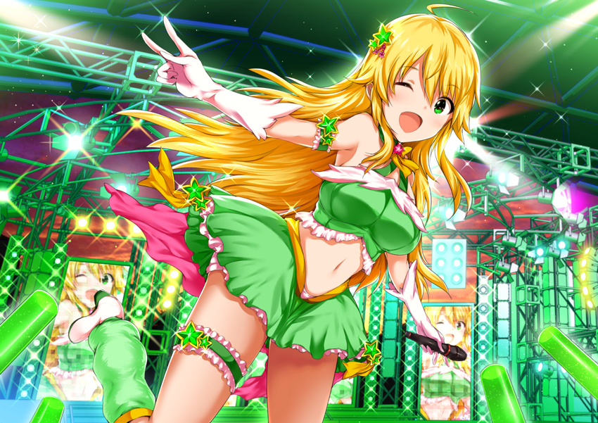 ;d ahoge bangs blonde_hair breasts commentary_request crop_top eyebrows_visible_through_hair frills gloves glowstick green_eyes green_skirt hair_between_eyes hair_ornament holding holding_microphone hoshii_miki idolmaster idolmaster_(classic) large_breasts leg_garter long_hair looking_at_viewer maruwa_tarou microphone navel one_eye_closed open_mouth skirt smile solo stage standing standing_on_one_leg star star_hair_ornament tareme