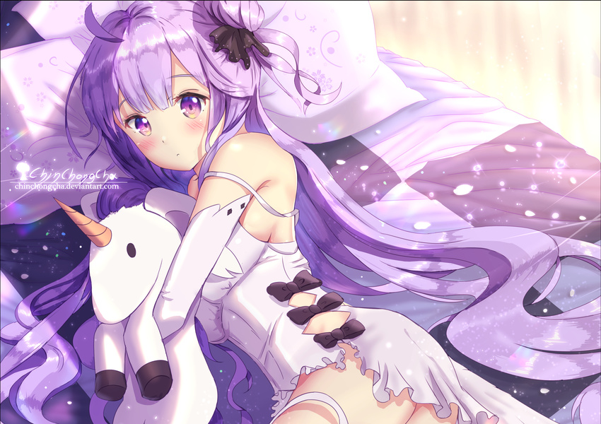 absurdres ahoge ass azur_lane bangs bed bedroom black_bow blush bow breasts chinchongcha dress eyebrows_visible_through_hair highres long_hair looking_at_viewer lying medium_breasts on_side petals pillow purple_eyes purple_hair shiny signature solo sparkle unicorn_(azur_lane) very_long_hair wavy_hair