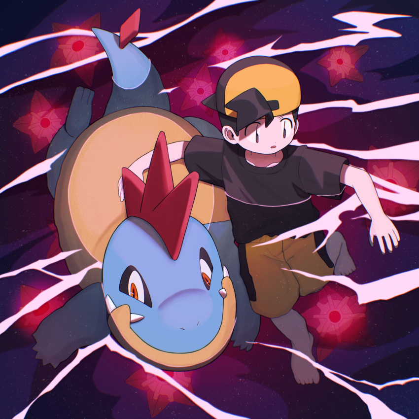 1boy backwards_hat barefoot baseball_cap black_eyes black_hair black_shirt croconaw fangs glowing hat highres huyugmy male_focus parted_lips pokemon pokemon_(creature) pokemon_gsc red_eyes shirt silver_(pokemon) staryu swimming water