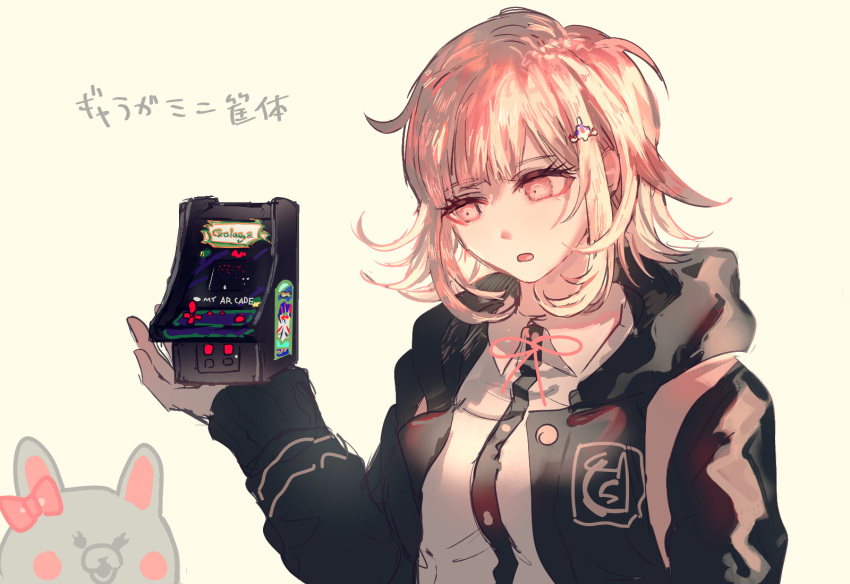 1girl :o arcade_cabinet backpack bag black_jacket bow brown_hair collared_shirt danganronpa_(series) danganronpa_2:_goodbye_despair dress_shirt ear_bow highres holding hood hood_down hooded_jacket jacket kaminezu long_sleeves medium_hair nanami_chiaki neck_ribbon open_clothes open_jacket pink_eyes pink_ribbon ribbon shirt solo translation_request two-tone_shirt upper_body