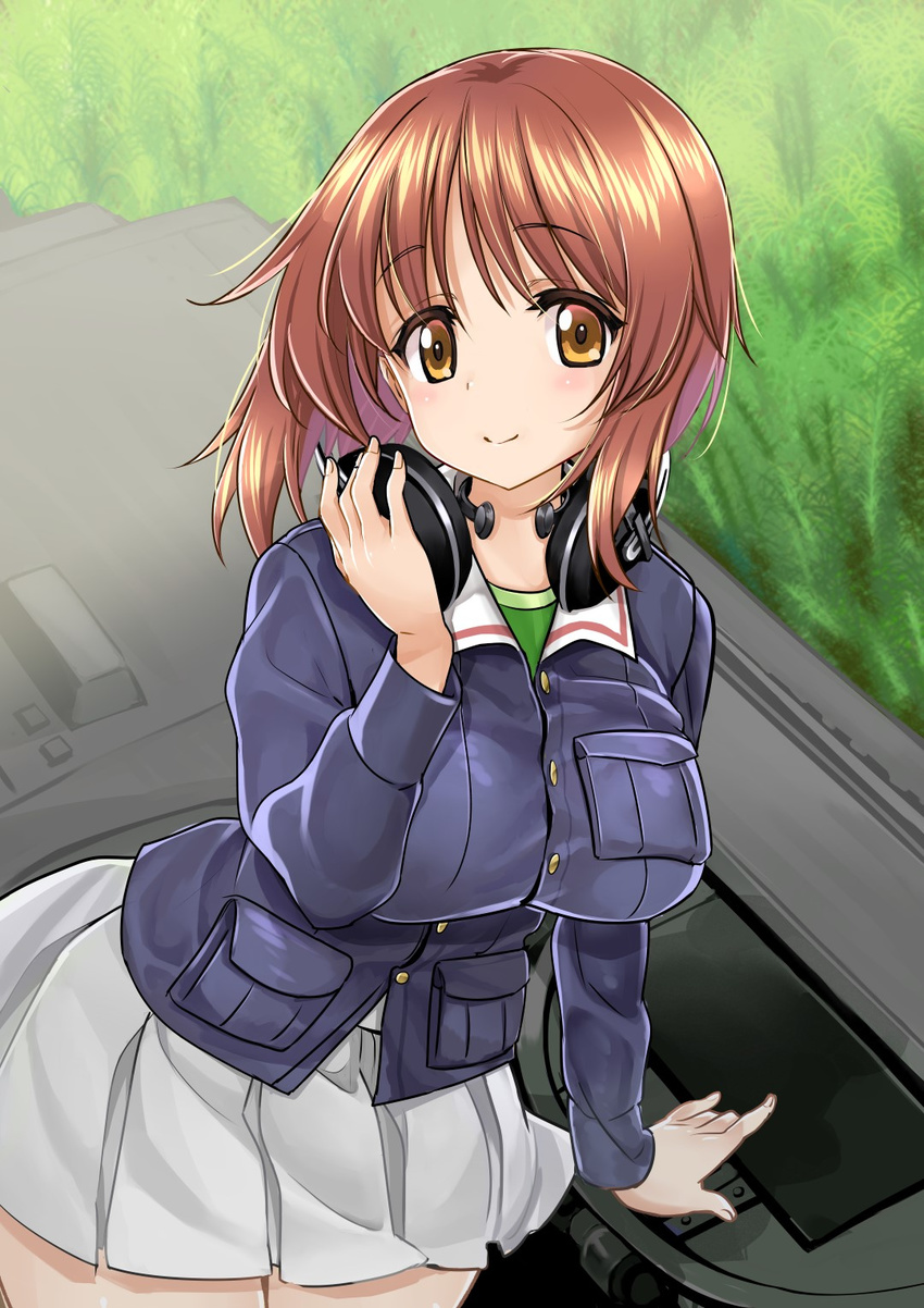 adjusting_headphones arm_support bangs blue_jacket breasts brown_eyes brown_hair closed_mouth eyebrows_visible_through_hair girls_und_panzer green_shirt ground_vehicle headphones headphones_around_neck highres jacket long_sleeves looking_at_viewer medium_breasts metk military military_uniform military_vehicle miniskirt motor_vehicle nishizumi_miho ooarai_military_uniform pleated_skirt shirt short_hair skirt smile solo standing tank throat_microphone uniform white_skirt