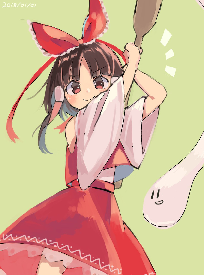 blush bow brown_hair closed_mouth commentary_request dated detached_sleeves eyebrows_visible_through_hair food green_background hair_bow hair_tubes hakurei_reimu highres holding long_sleeves looking_at_viewer mochi mochi_(touhou) mochitsuki red_bow red_eyes red_skirt red_vest sasa_kichi simple_background skirt smile solo standing touhou vest wagashi wide_sleeves