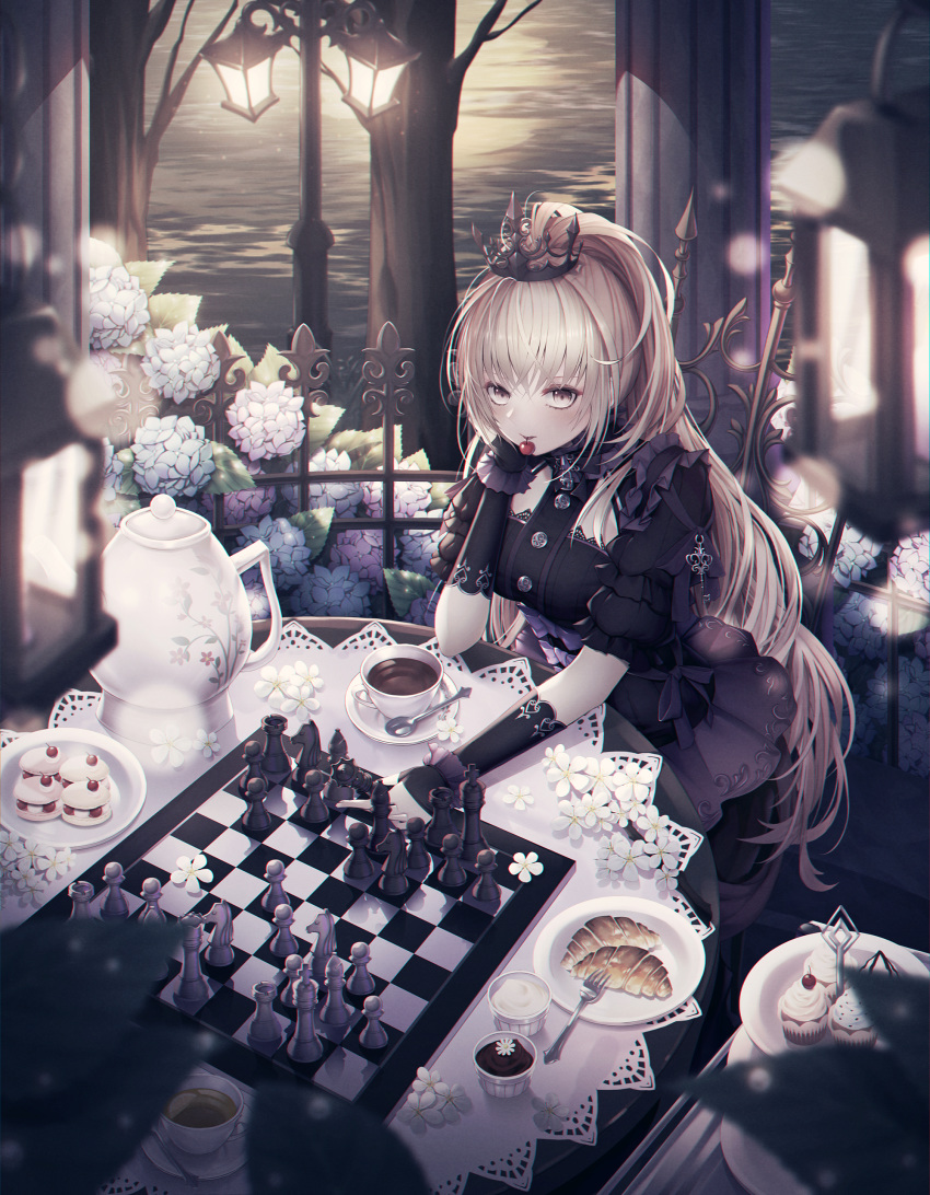 absurdres bangs black_dress black_gloves blurry blush board_game breasts brown_eyes cecil86 cherry chess chessboard commentary croissant cuffs cup cupcake depth_of_field dress fingerless_gloves flower food fruit gloves hand_on_own_cheek highres hydrangea lamppost lantern leaf light_brown_hair long_hair looking_at_viewer medium_breasts mouth_hold original plate saucer sitting solo table teacup teapot tiara water