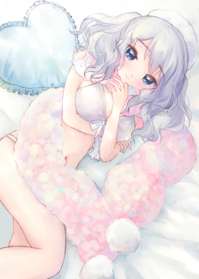 bangs bare_arms bare_legs bed beret between_breasts blue_eyes blush breasts bunapi_(bunapii) closed_mouth commentary_request dutch_angle eyebrows eyebrows_visible_through_hair frilled_pillow frills front-tie_top hair_between_eyes hand_between_breasts hat heart heart_pillow highres kantai_collection kashima_(kantai_collection) large_breasts long_hair looking_at_viewer lying on_bed on_side pale_color pillow pom_pom_(clothes) scarf sidelocks silver_hair smile solo swimsuit tsurime twintails wavy_hair white white_background white_hat white_swimsuit