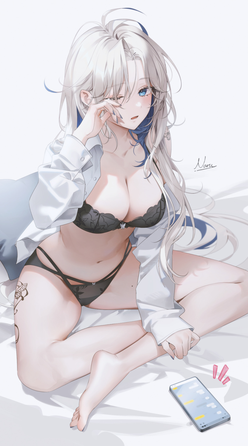 1girl ;o ahoge bed_sheet black_bra black_panties blush bra breasts cellphone cellphone_photo cleavage collarbone commentary fingernails grey_hair highres indian_style large_breasts leg_tattoo looking_at_viewer mole mole_on_thigh nail_polish naru_0 one_eye_closed open_clothes open_shirt original panties phone shirt shoulder_tattoo sitting sleepy solo tattoo toenail_polish toenails underwear white_shirt
