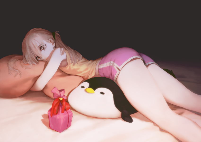 absurdres ass bangs blonde_hair boyshorts closed_mouth from_side gift highres jun_(seojh1029) legs light_brown_eyes looking_at_viewer looking_to_the_side lying on_back original pillow pillow_hug red_ribbon ribbon solo twintails