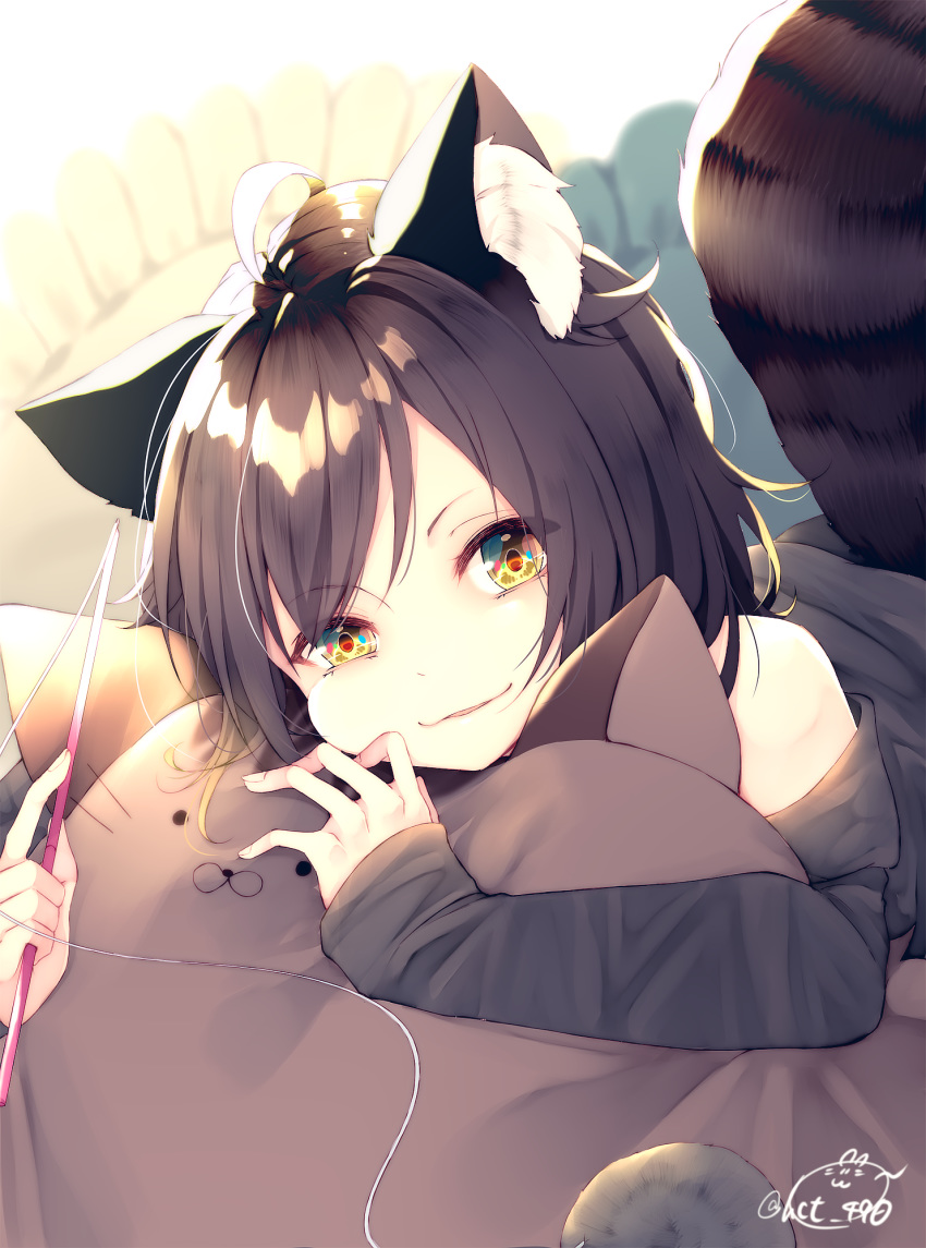 ahoge animal_ear_fluff animal_ears bangs bare_shoulders black_shirt blurry blurry_background brown_hair cat_pillow chita_(ketchup) commentary_request depth_of_field eyebrows_visible_through_hair fingernails highres holding long_sleeves looking_at_viewer object_hug off_shoulder original parted_lips pillow shirt signature sleeves_past_wrists smile solo tail white_background yellow_eyes
