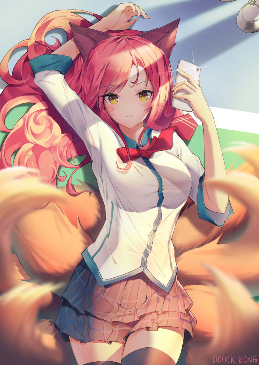 academy_ahri ahri animal_ears arm_up bangs black_legwear blurry blurry_foreground blush bow bowtie breasts brown_eyes cellphone closed_mouth commentary depth_of_field eyebrows_visible_through_hair facial_mark fox_ears fox_girl fox_tail glint grey_skirt hand_up highres holding holding_cellphone holding_phone kyuubi layered_skirt league_of_legends lee_seok_ho long_hair looking_at_viewer lying medium_breasts multiple_tails necktie on_back phone pink_hair pleated_skirt red_neckwear shirt short_sleeves skirt solo tail thighhighs very_long_hair whisker_markings white_shirt