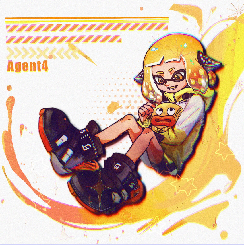 1girl agent_4_(splatoon) bike_shorts black_footwear black_shorts blonde_hair character_name chinese_commentary chromatic_aberration colored_tongue fangs film_grain headgear highres inkling_girl inkling_player_character large_shoes long_sleeves open_mouth orange_eyes shoes short_hair shorts single_vertical_stripe smile splatoon_(series) splatoon_2 star_(symbol) tentacle_hair thenintlichen96 yellow_tongue zapfish