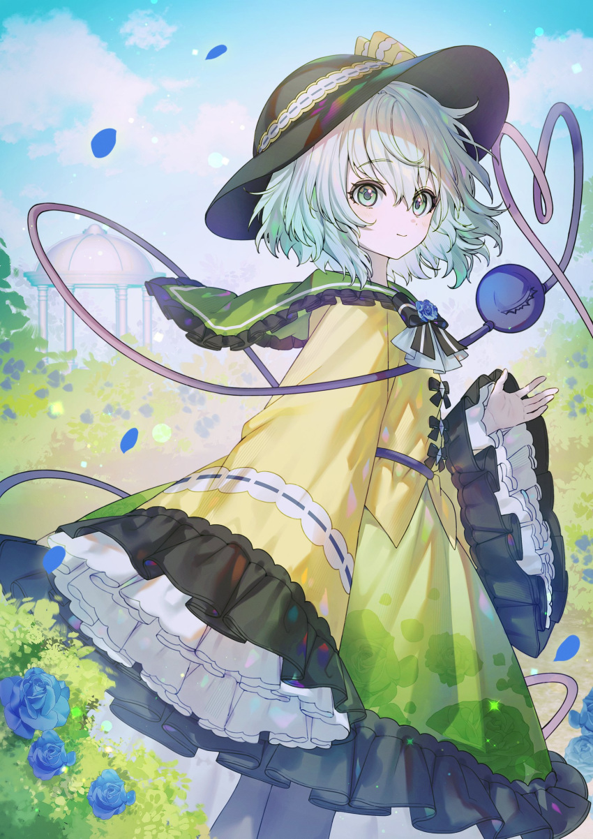 1girl absurdres ascot black_bow black_bowtie black_hat black_pantyhose blue_flower blue_rose blue_sky bow bowtie closed_mouth cloud commentary_request day falling_petals flower frilled_skirt frilled_sleeves frills gazebo green_eyes green_hair green_skirt hand_up hat heart heart_of_string here_(hr_rz_ggg) highres komeiji_koishi long_sleeves looking_at_viewer medium_hair outdoors pantyhose petals rose skirt sky sleeves_past_fingers sleeves_past_wrists smile solo third_eye touhou white_ascot wide_sleeves