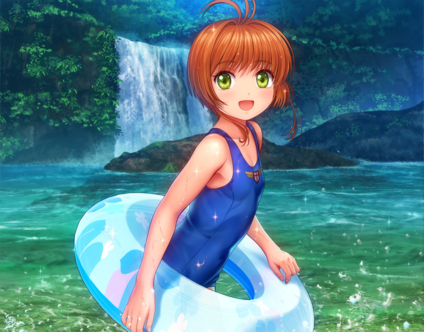 antenna_hair breasts brown_hair cardcaptor_sakura cowboy_shot eyebrows_visible_through_hair forest green_eyes highres innertube kinomoto_sakura mutsuki_(moonknives) nature one-piece_swimsuit open_mouth outdoors school_swimsuit short_hair small_breasts solo standing swimsuit tree water waterfall wet