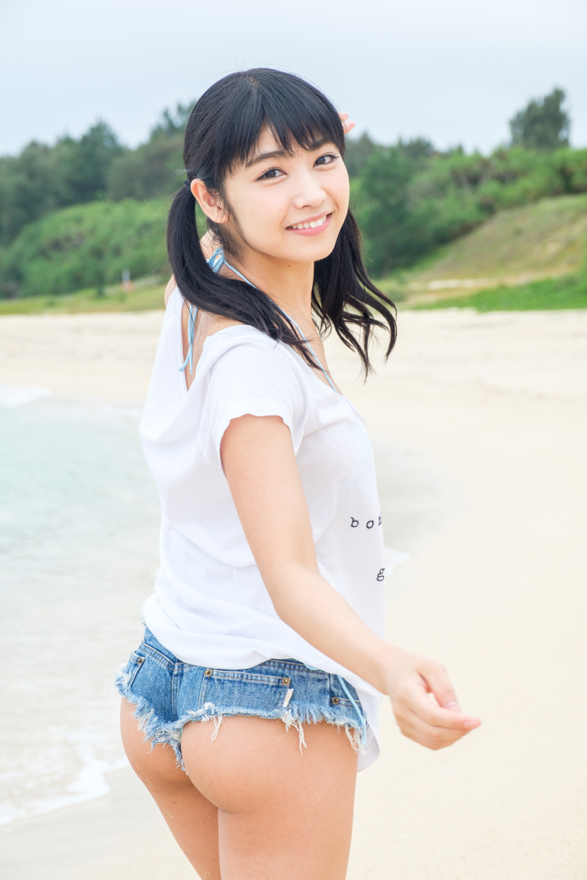 1girl asian ass back bikini black_hair curvy denim from_behind huge_ass idol japanese_(nationality) jeans lips looking_at_viewer looking_back nagai_rina narrow_waist pants photo pouty_lips shiny shiny_skin smile solo swimsuit thighs wedgie