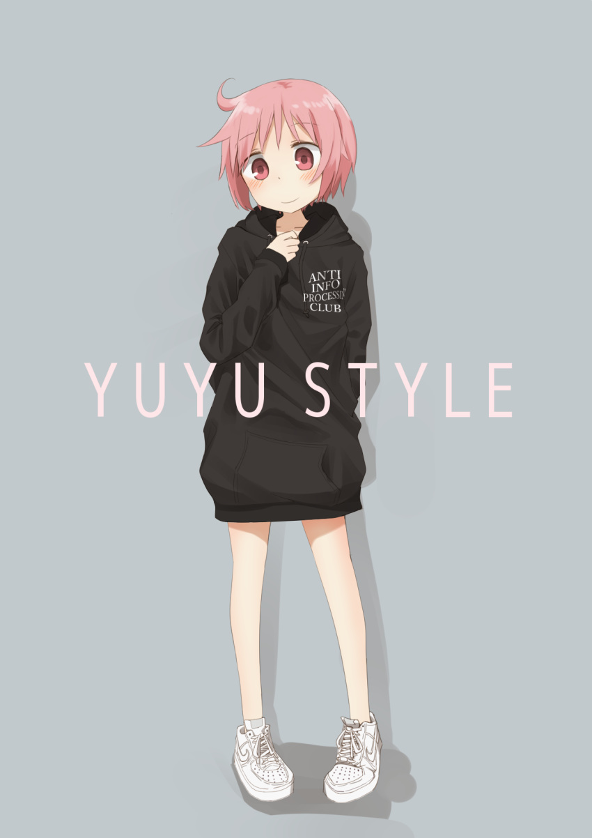 ahoge baggy_clothes bangs bare_legs black_hoodie blush closed_mouth clothes_writing collarbone drawstring eyebrows_visible_through_hair highres hood hoodie horoda_(user_wfaw4827) long_sleeves looking_at_viewer naked_hoodie nonohara_yuzuko pink_hair shoes short_hair smile sneakers solo standing white_footwear yuyushiki