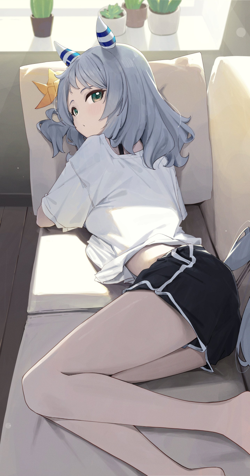 1girl absurdres animal_ears breasts cactus couch ear_covers ear_ornament grey_hair hair_ornament highres hishi_miracle_(umamusume) horse_ears horse_girl horse_tail looking_at_viewer lying medium_breasts medium_hair ningen_gokko pillow shirt shorts solo tail tree umamusume white_shirt