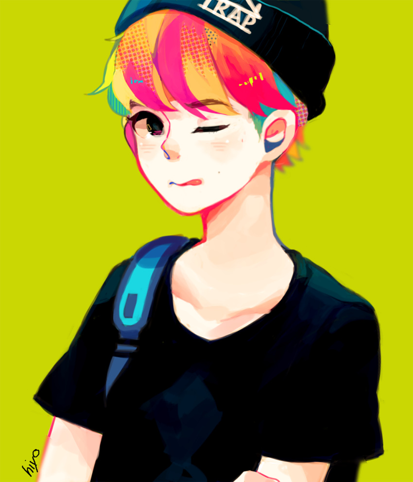 artist_name backpack bag bangs beanie black_shirt commentary english_commentary green_background hat highres looking_at_viewer male_focus mole_above_mouth one_eye_closed original pink_hair routexx shirt short_sleeves simple_background solo tongue tongue_out upper_body