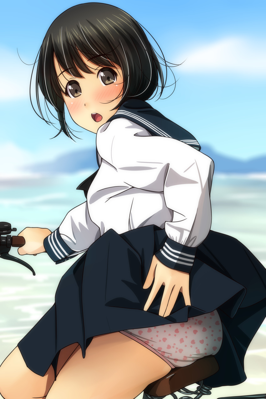 1girl :o absurdres bangs bicycle black_hair black_sailor_collar black_skirt blue_sky blurry blurry_background blush brown_eyes cloud day depth_of_field eyebrows_visible_through_hair ground_vehicle heart heart_panties heart_print highres long_sleeves looking_at_viewer looking_to_the_side matsunaga_kouyou open_mouth original outdoors panties pleated_skirt print_panties sailor_collar shirt skirt skirt_lift sky sleeves_past_wrists solo underwear white_panties white_shirt wind wind_lift