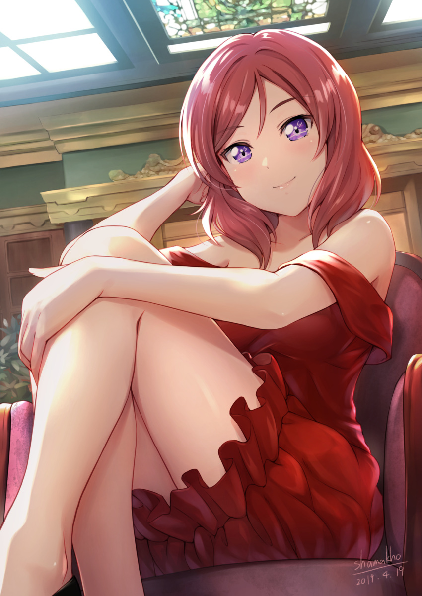 1girl bangs bare_shoulders blush breasts chair dated dress eyebrows_visible_through_hair highres leg_hug legs_crossed lips looking_at_viewer love_live! love_live!_school_idol_project medium_breasts medium_hair nishikino_maki purple_eyes red_dress red_hair shamakho shiny shiny_hair signature sitting skylight smile solo strapless strapless_dress swept_bangs