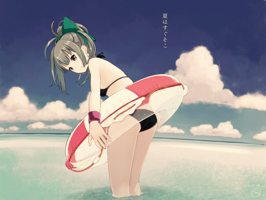 1girl armband bangs bikini black_swimsuit bow closed_mouth cloud dated day eyebrows_visible_through_hair grey_hair hair_between_eyes hair_bow highres innertube kantai_collection kokudou_juunigou long_hair looking_at_viewer outdoors ponytail signature sky smile solo standing striped swimsuit translation_request water yuubari_(kantai_collection)