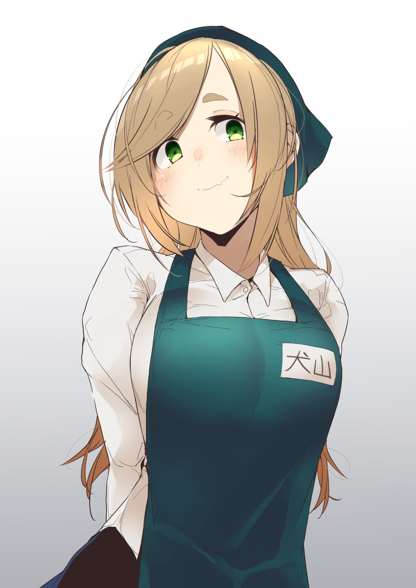 1girl absurdres apron arms_behind_back bangs blush breasts brown_hair closed_mouth collared_shirt eyebrows_visible_through_hair fang gradient gradient_background green_eyes grey_background head_scarf highres inuyama_aoi kobo_(cobo_0609) large_breasts long_hair long_sleeves looking_at_viewer name_tag shirt simple_background skin_fang smile solo standing thick_eyebrows white_shirt yurucamp