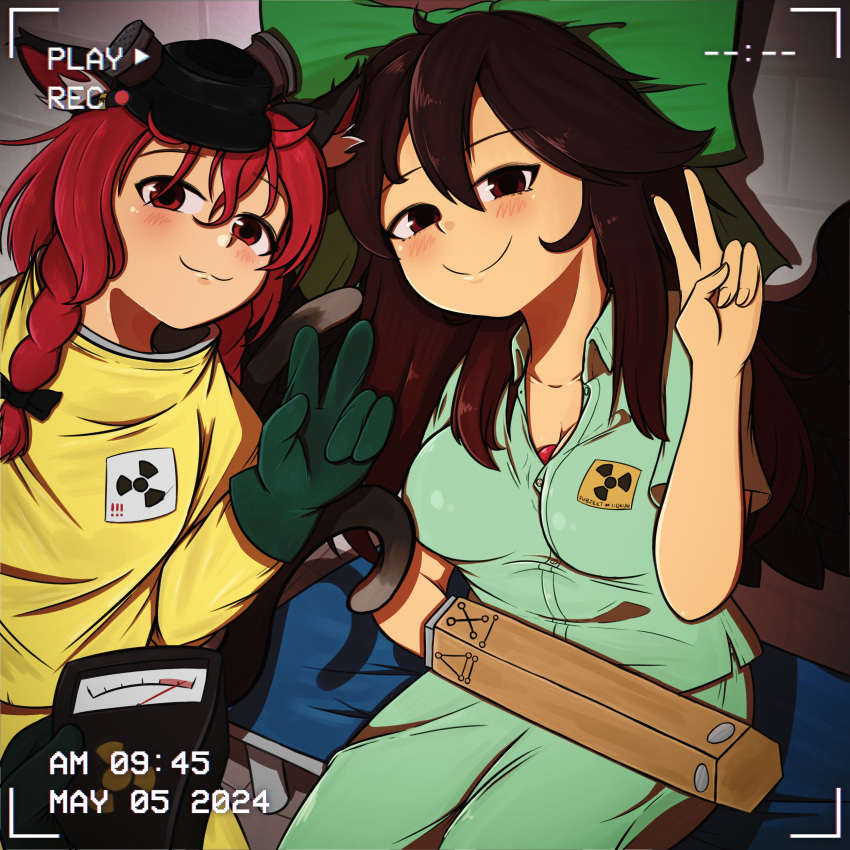 2girls :3 absurdres alternate_costume animal_ears arm_cannon black_hair bow braid cat_ears cat_girl closed_mouth cloudykeyz commentary dated english_commentary gloves green_bow hair_bow hazmat_suit highres kaenbyou_rin long_hair medium_hair multiple_girls radiation_symbol recording red_eyes red_hair reiuji_utsuho side_braids smile touhou twin_braids v weapon