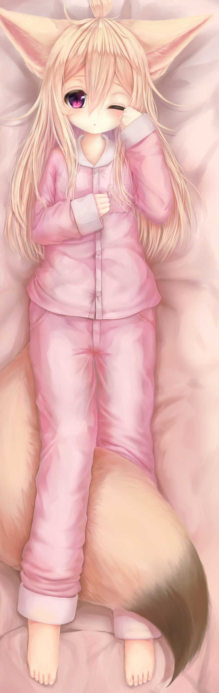 1girl :o absurdres ahoge animal_ears blonde_hair dakimakura fox_ears fox_tail hair_between_eyes highres long_hair lying on_back one_eye_closed original pdf_available pink_pajamas purple_eyes slit_pupils tail toripuru