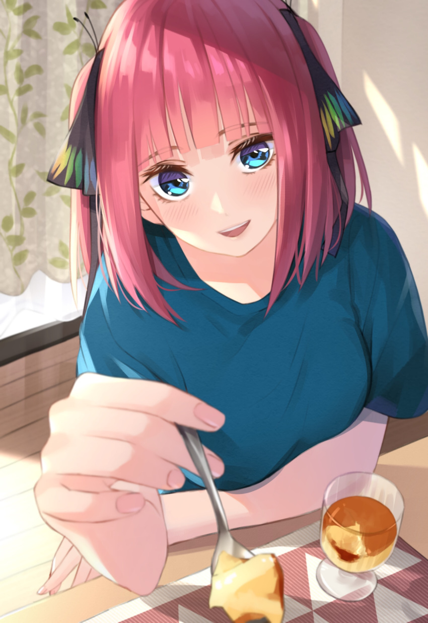 1girl :d absurdres bangs blue_eyes blue_shirt blunt_bangs blurry blush breasts butterfly_hair_ornament curtains day depth_of_field eyebrows_visible_through_hair feeding fingernails food go-toubun_no_hanayome hair_between_eyes hair_ornament hair_ribbon hand_up highres holding holding_spoon indoors large_breasts medium_hair nakano_nino open_mouth pov pov_feeding pudding red_hair ribbon shirt short_sleeves sidelocks sitting smile spoon t-shirt table teeth to_gemichi two_side_up window window_shade