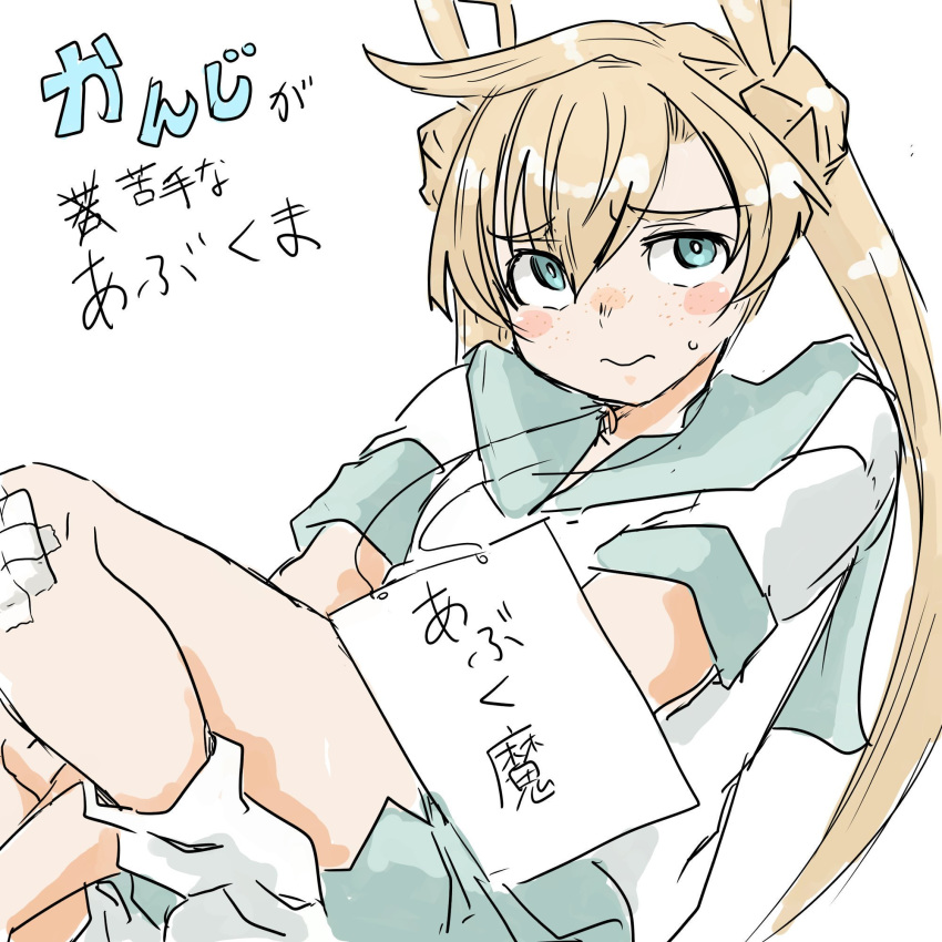 1girl abukuma_(kantai_collection) arms_between_legs asymmetrical_bangs bandaid bandaid_on_knee bangs blonde_hair blue_eyes blush collarbone commentary_request double_bun eyebrows_visible_through_hair folded_leg freckles green_sailor_collar green_skirt hair_between_eyes hair_rings highres kantai_collection long_hair looking_at_viewer poyo_(hellmayuge) sailor_collar school_uniform serafuku short_sleeves simple_background skirt solo translation_request wavy_mouth white_background white_legwear