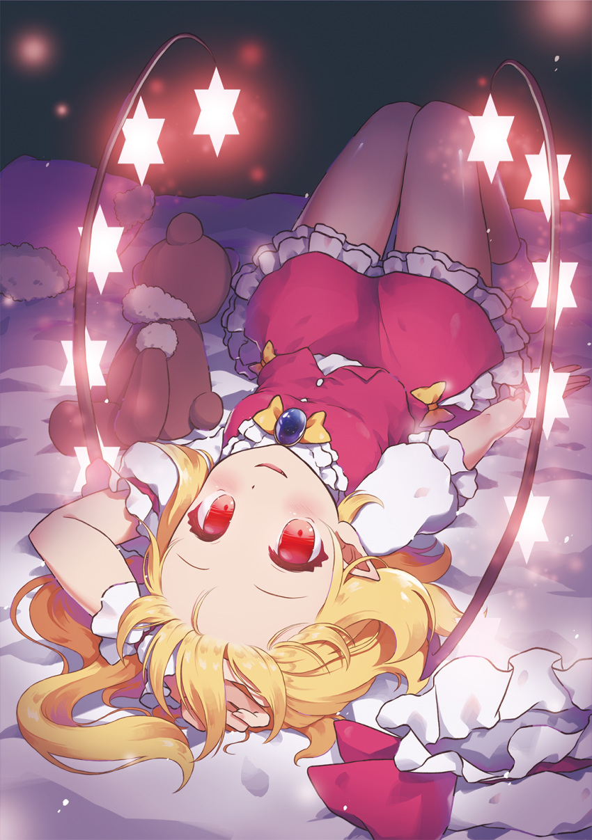 1girl arm_up bed beni_kurage blonde_hair blush bow bowtie breasts brooch commentary_request fang flandre_scarlet forehead hat hat_removed hat_ribbon headwear_removed highres jewelry knees_up looking_at_viewer lying mob_cap no_shoes on_back parted_lips petticoat pillow puffy_short_sleeves puffy_sleeves red_eyes red_ribbon red_skirt red_vest ribbon shirt short_hair short_sleeves skirt skirt_set small_breasts smile socks solo stuffed_animal stuffed_toy teddy_bear thighs touhou vest white_hat white_legwear white_shirt wings wrist_cuffs yellow_bow yellow_neckwear