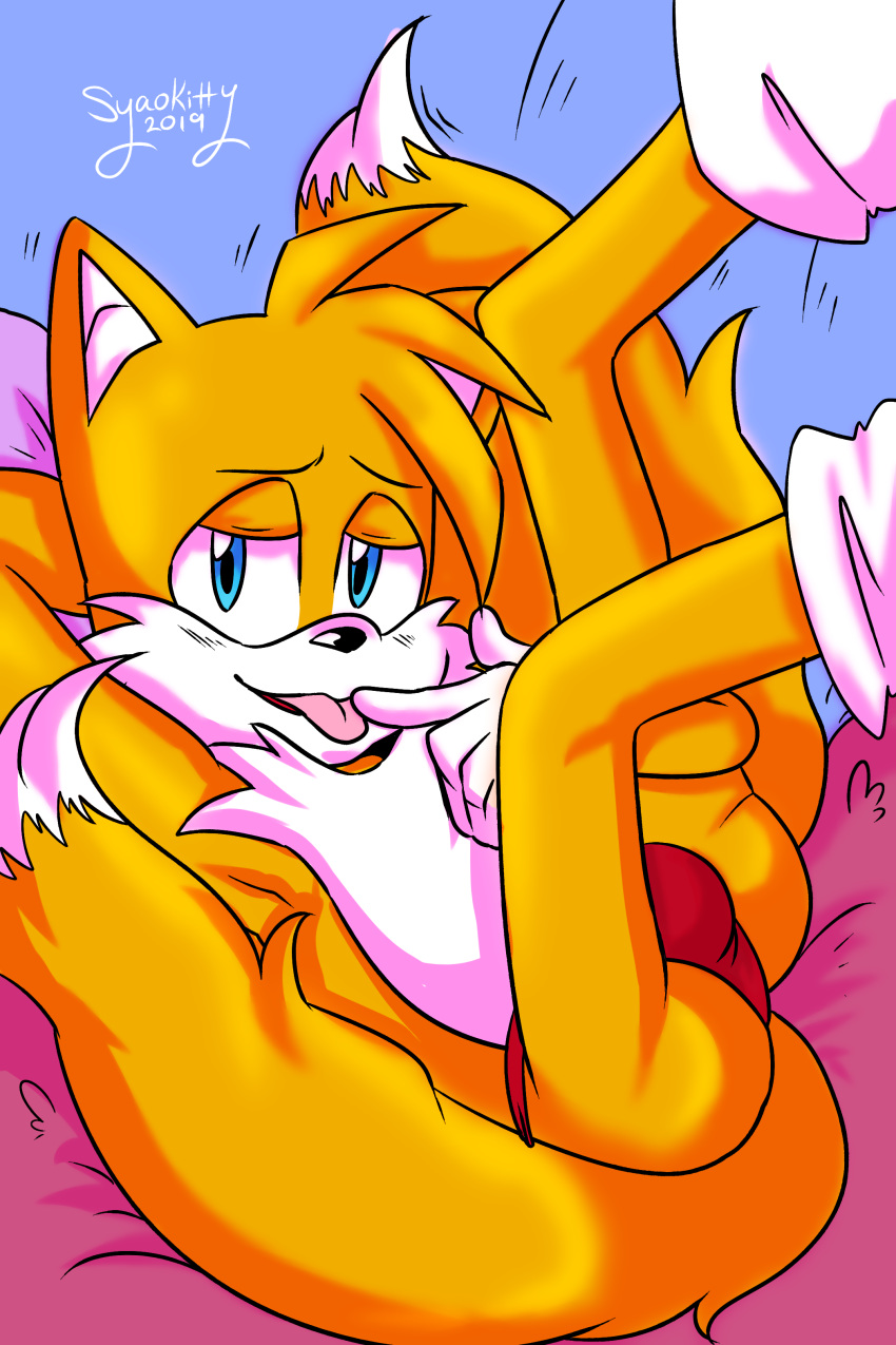 2019 2_tails absurd_res anthro bedroom_eyes blue_eyes bulge canid canine clothing dipstick_tail finger_lick fox fur gloves half-closed_eyes handwear hi_res legwear licking looking_at_viewer lying male mammal miles_prower multi_tail multicolored_tail orange_fur seductive signature socks solo sonic_(series) syaokitty teasing thong tongue tongue_out white_fur