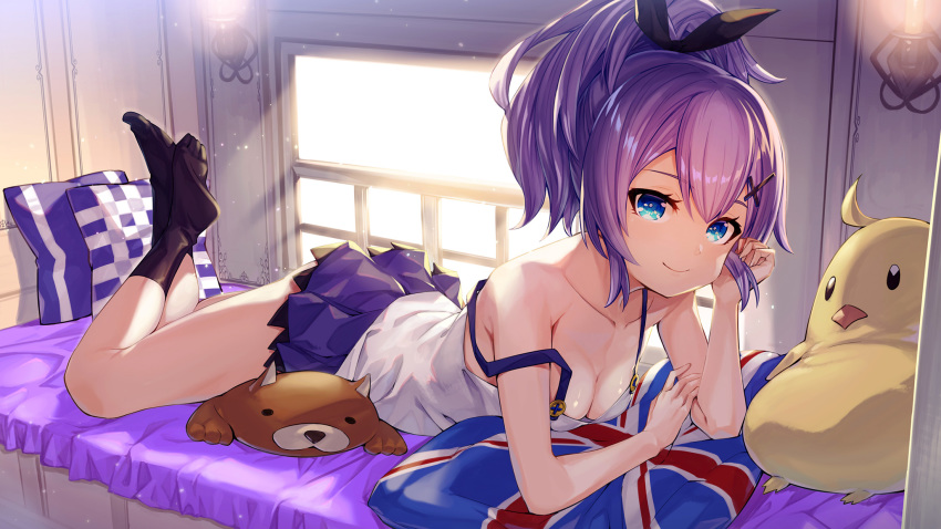 1girl akanagi_youto azur_lane bangs bare_arms bare_shoulders bed black_legwear black_ribbon blue_eyes breasts camisole cleavage collarbone commentary_request cross_hair_ornament eyebrows_visible_through_hair hair_ornament hair_ribbon hand_up highres indoors javelin_(azur_lane) light_particles looking_at_viewer lying miniskirt no_shoes on_stomach pillow pleated_skirt ponytail purple_hair purple_skirt ribbon short_hair skirt small_breasts smile socks solo strap_slip stuffed_animal stuffed_chicken stuffed_toy teddy_bear thighs window
