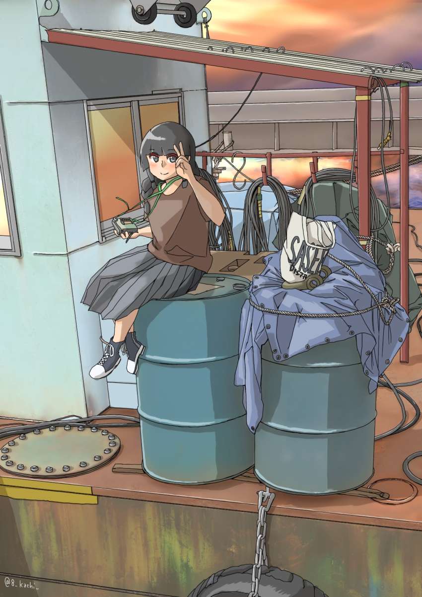 1girl alternate_costume bag bangs black_eyes black_hair blunt_bangs braid brown_shirt cable camera casual drum_(container) foot_dangle grey_skirt hair_over_shoulder highres holding holding_camera kachi_(kachi5100) kantai_collection kitakami_(kantai_collection) long_hair long_skirt looking_at_viewer no_socks pleated_skirt rooftop rope scenery shirt shoes sidelocks single_braid sitting sitting_on_object skirt smile sneakers solo sunset tarpaulin tire v wide_shot window