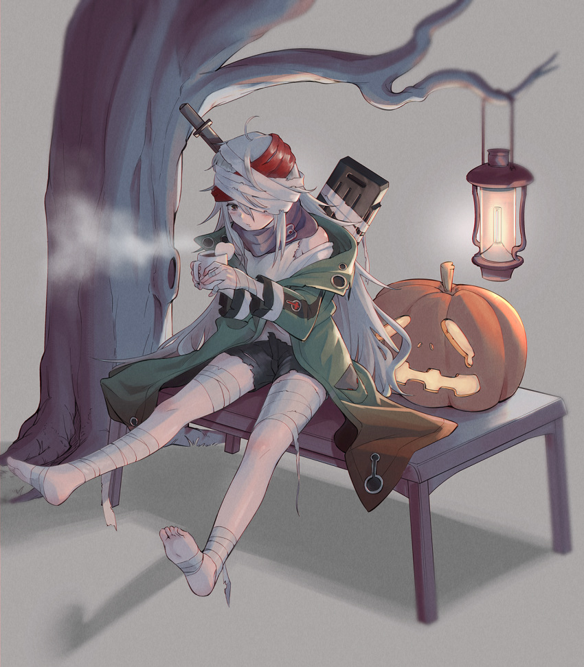 1girl assault_rifle bandaged_arm bandaged_head bandaged_leg bandages bare_tree black_scarf commentary_request cup g11_(girls_frontline) girls_frontline green_jacket grey_hair gun h&amp;k_g11 halloween highres holding holding_cup jack-o'-lantern jacket knife long_hair long_sleeves no_hat no_headwear pumpkin red_scarf rifle scarf scarf_on_head shirt shorts soguma solo torn_clothes tree weapon white_shirt