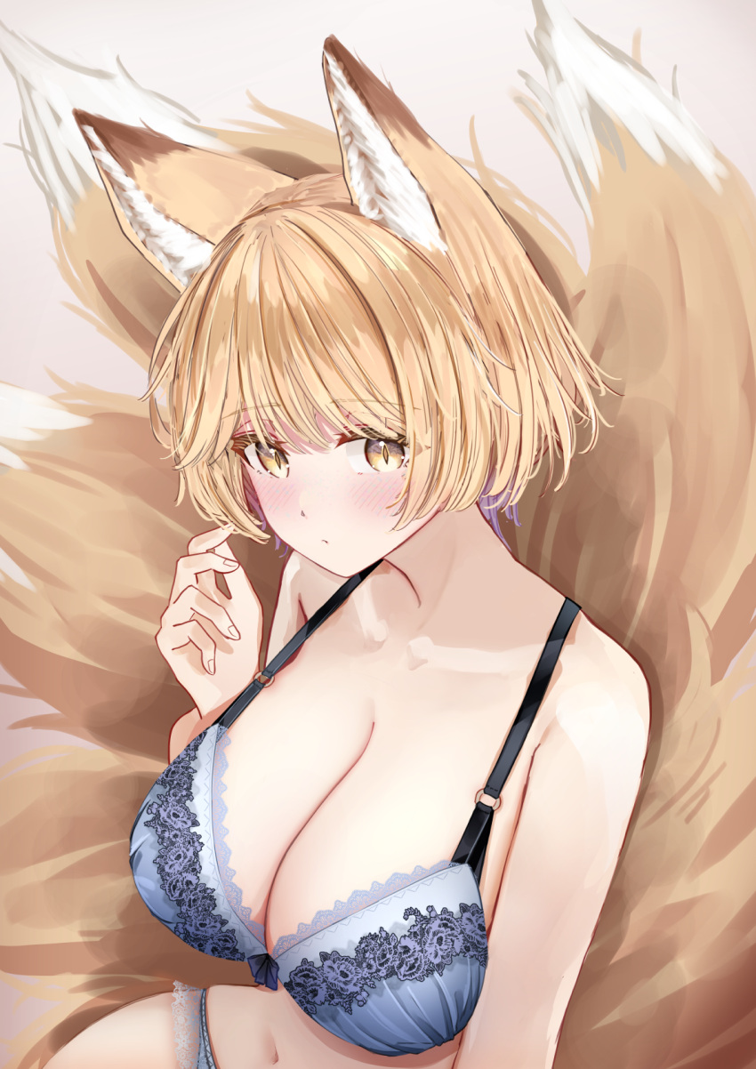 1girl animal_ears blonde_hair blue_bra blush bra breasts cleavage closed_mouth fox_ears fox_tail highres large_breasts looking_at_viewer multiple_tails navel sarasadou_dan short_hair slit_pupils solo tail touhou underwear underwear_only yakumo_ran yellow_eyes
