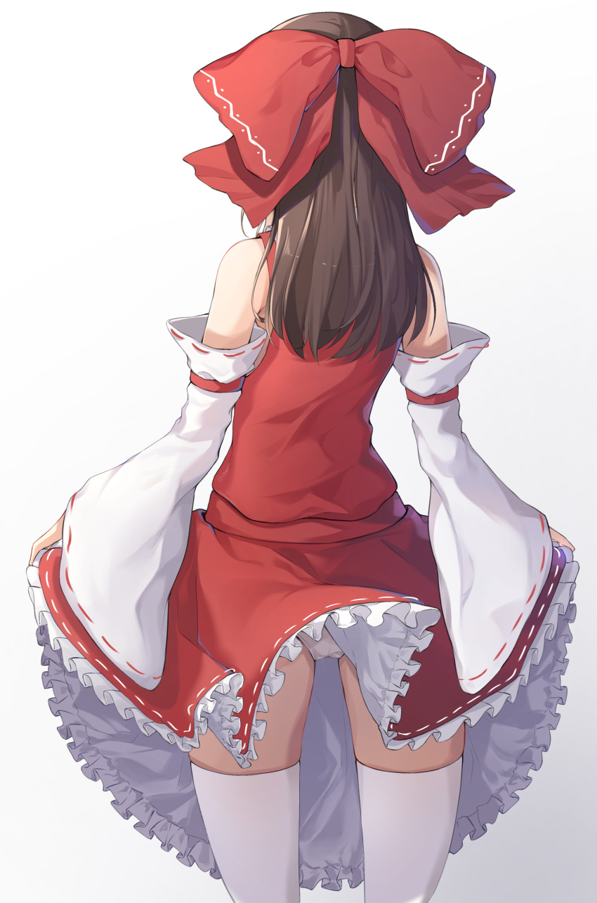 1girl absurdres bare_shoulders black_hair bow commentary_request cowboy_shot detached_sleeves from_behind gradient gradient_background grey_background hair_bow hakurei_reimu highres korean_commentary long_hair long_sleeves panties pantyshot pantyshot_(standing) petticoat red_bow red_skirt ribbon-trimmed_sleeves ribbon_trim skirt skirt_hold skirt_set solo standing thighhighs thighs touhou underwear white_background white_legwear white_panties wide_sleeves z_loader