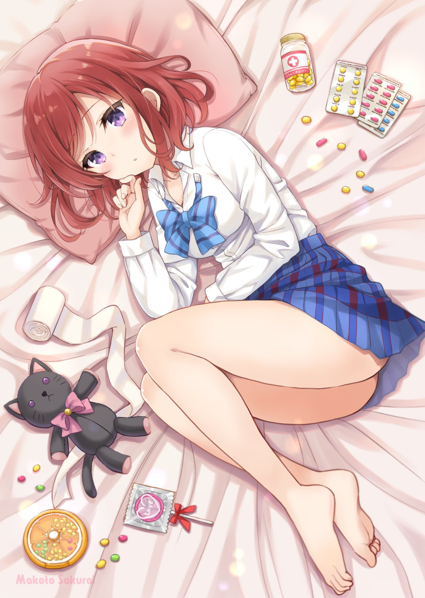 1girl :o artist_name bandages barefoot bed_sheet blue_neckwear blue_skirt blush bottle bow bowtie candy collared_shirt commentary_request condom finger_to_chin food highres lollipop long_hair looking_at_viewer love_live! love_live!_school_idol_project lying miniskirt nishikino_maki on_side otonokizaka_school_uniform pill pillow pink_neckwear plaid_neckwear purple_eyes red_hair sakurai_makoto_(custom_size) school_uniform shirt short_hair skirt solo striped striped_neckwear stuffed_animal stuffed_cat stuffed_toy undone_bowtie white_shirt